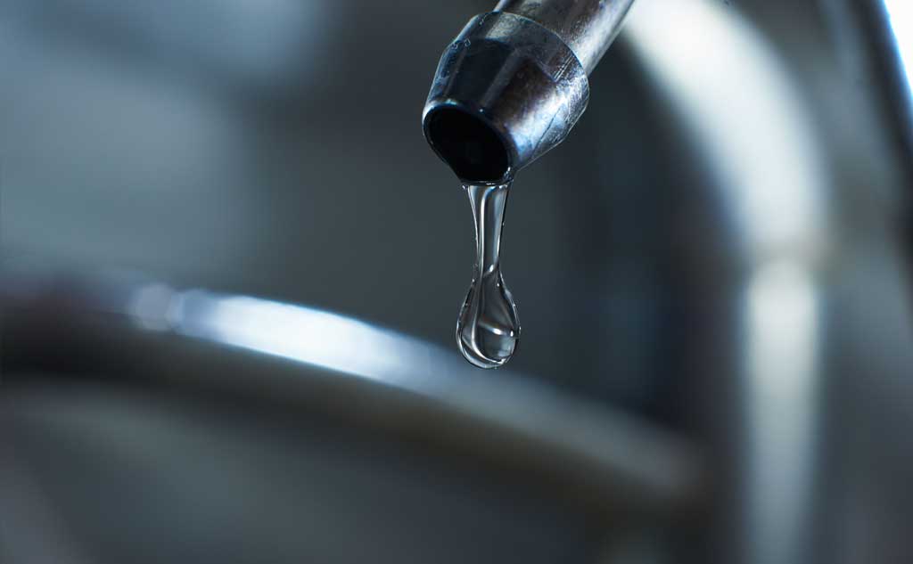 One obvious way to lower your water bill is by fixing any leaking faucets around the house. Furthermore, reducing your water heater can also save cost on your heating bill.